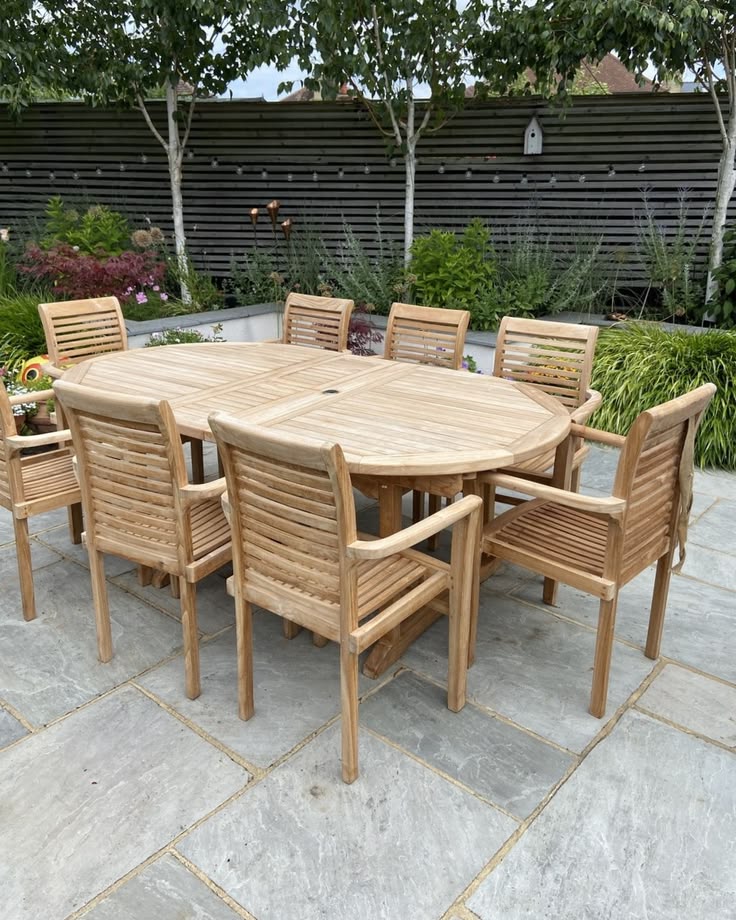 357f7dfa7bb4fdb08bf5d859b7949216 Modern Teak Garden Dining Set - Image 1